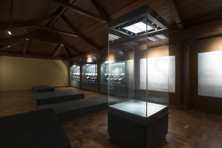 What are museum display cases made of?